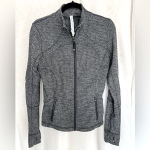 Lululemon define jacket size 10. Used, please see photos for wear on wrists.